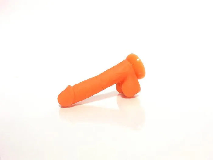 Rascal The Player Glow Dual Layer Orange Dildo